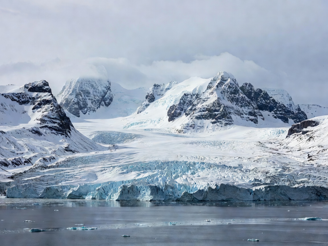 Arctic glaciers and desolate snowy peaks of Svalbard Norway
